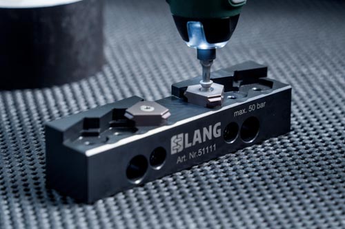 Installation of the stamping inserts in a Makro•4Grip stamping jaw.